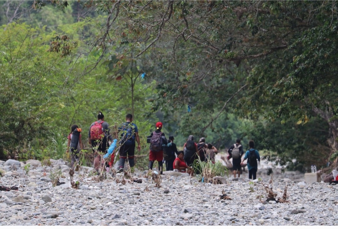 Migrants crossing the Darien Gap